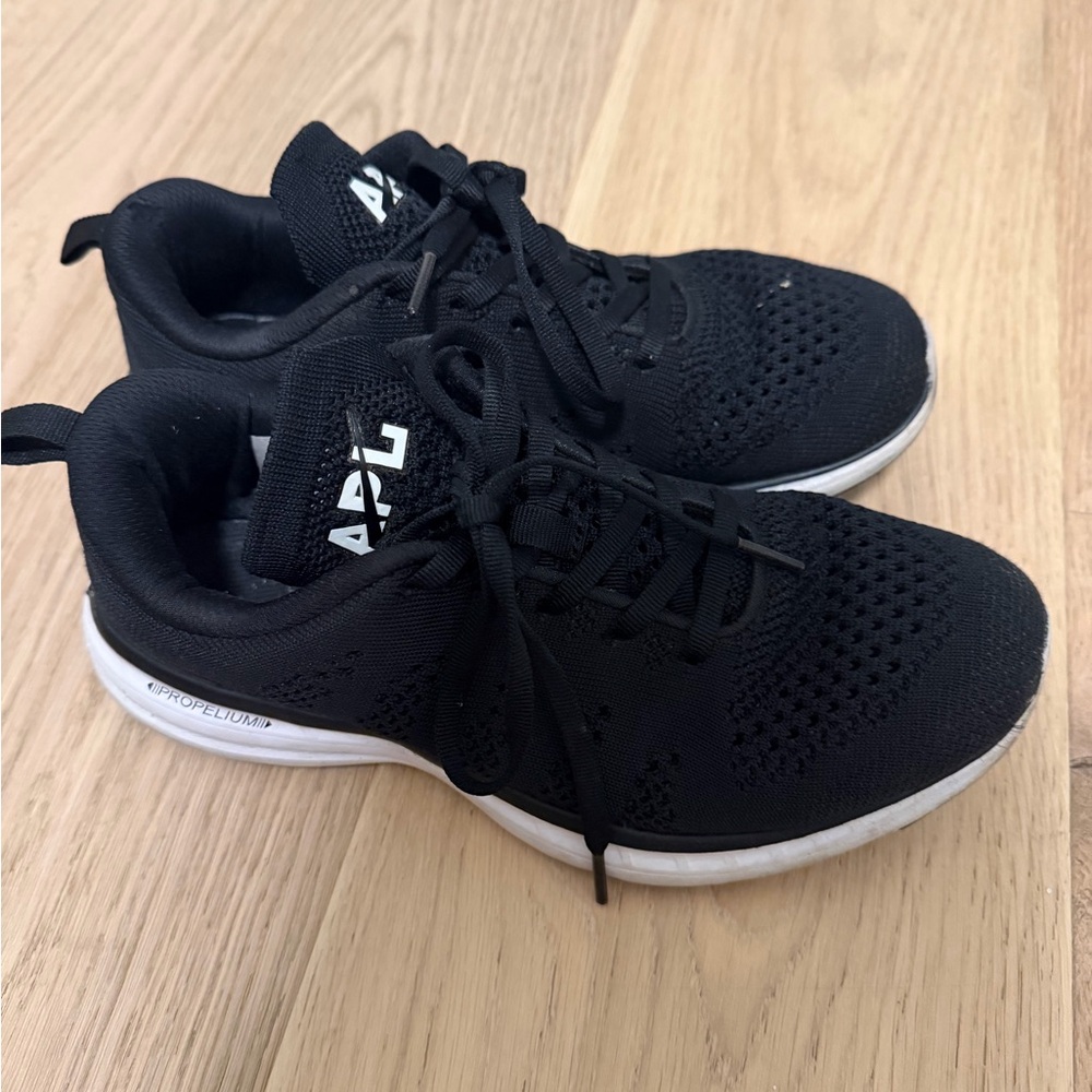 APL women’s  Black and White Athletic Shoes